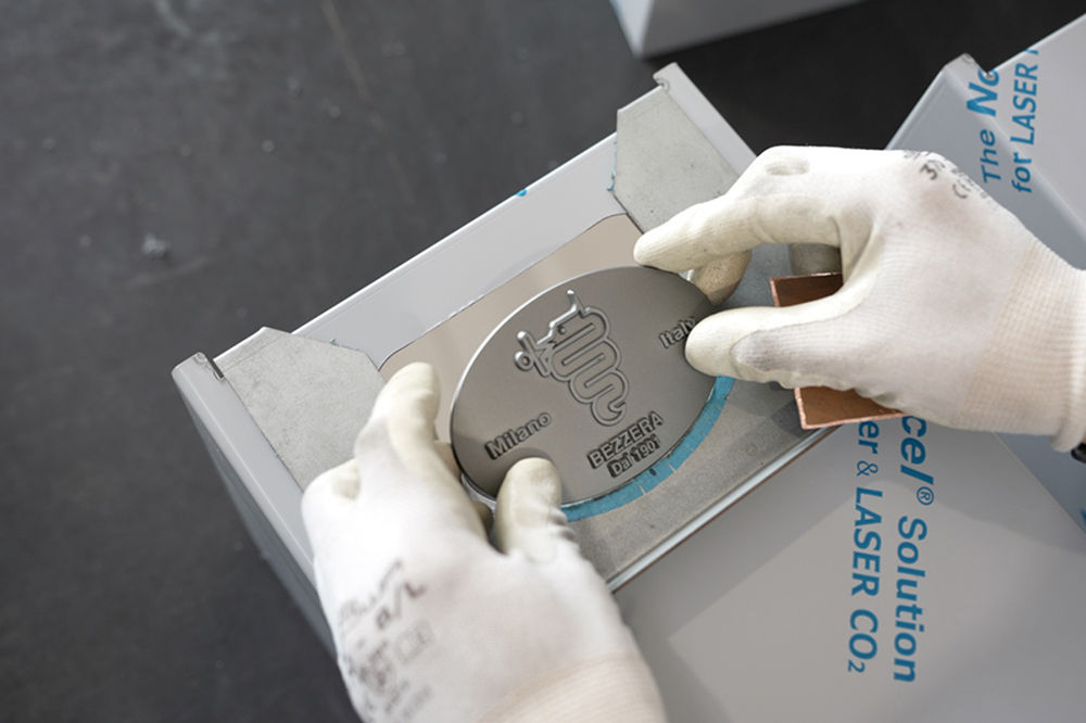 Milan Coat of Arms and the logo for Bezzera being stick on a bezzera professional coffee machine